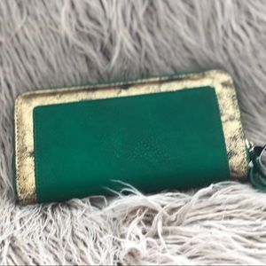 Rustic green wallet with gold details